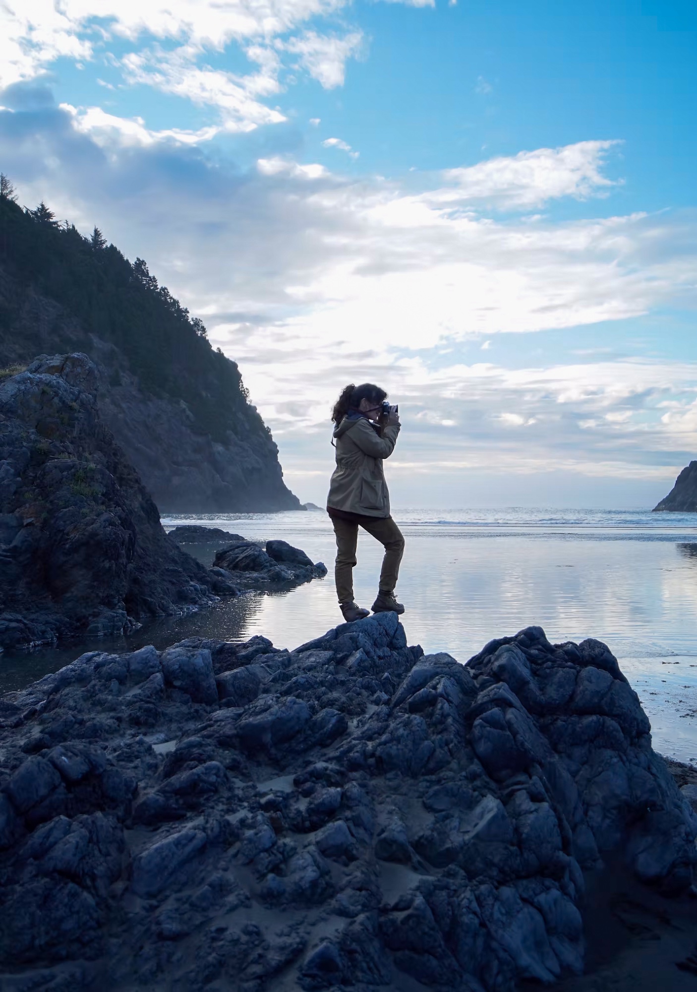 Kim Foster photographing on the Oregon coast at blue hour